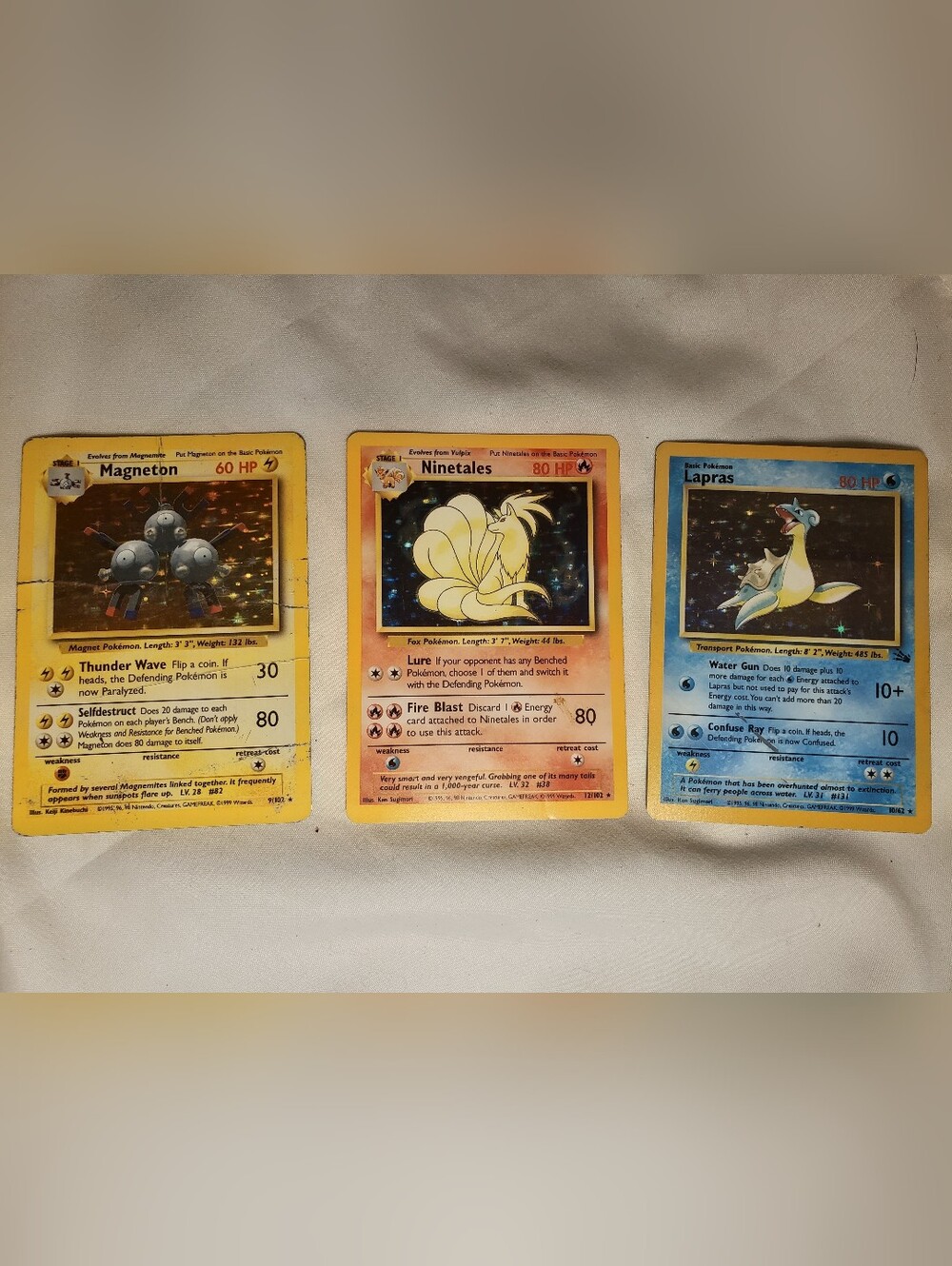 ​Vintage Pokemon Card Lot-3 Holo Rares - Ninetales Base, Lapras Fossil, Magneton
